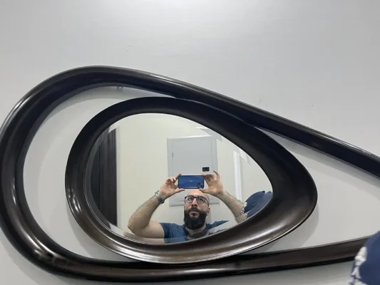 Buy Natural Wood Furniture in Egypt – 100% Natural Wood | Woldars 2 Wooden framed wall mirror with a unique asymmetric design.