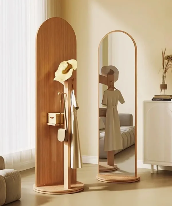 Lux full-length mirror with natural wood coat rack in modern bedroom setting